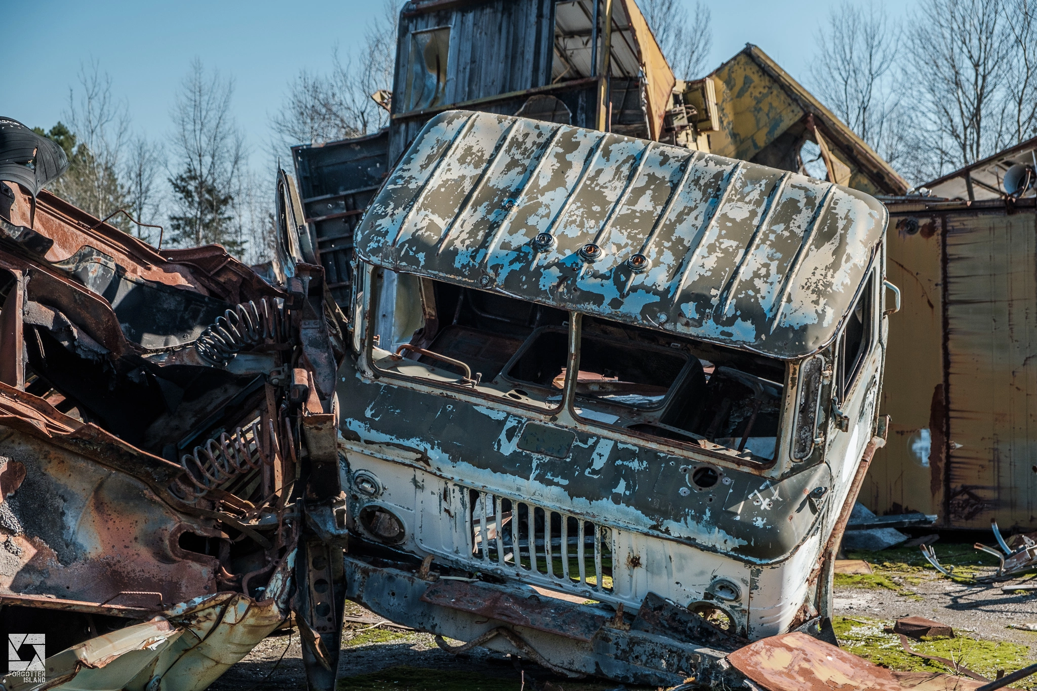 Chernobyl-Rossokha-Vehicle-Graveyard-06.webp