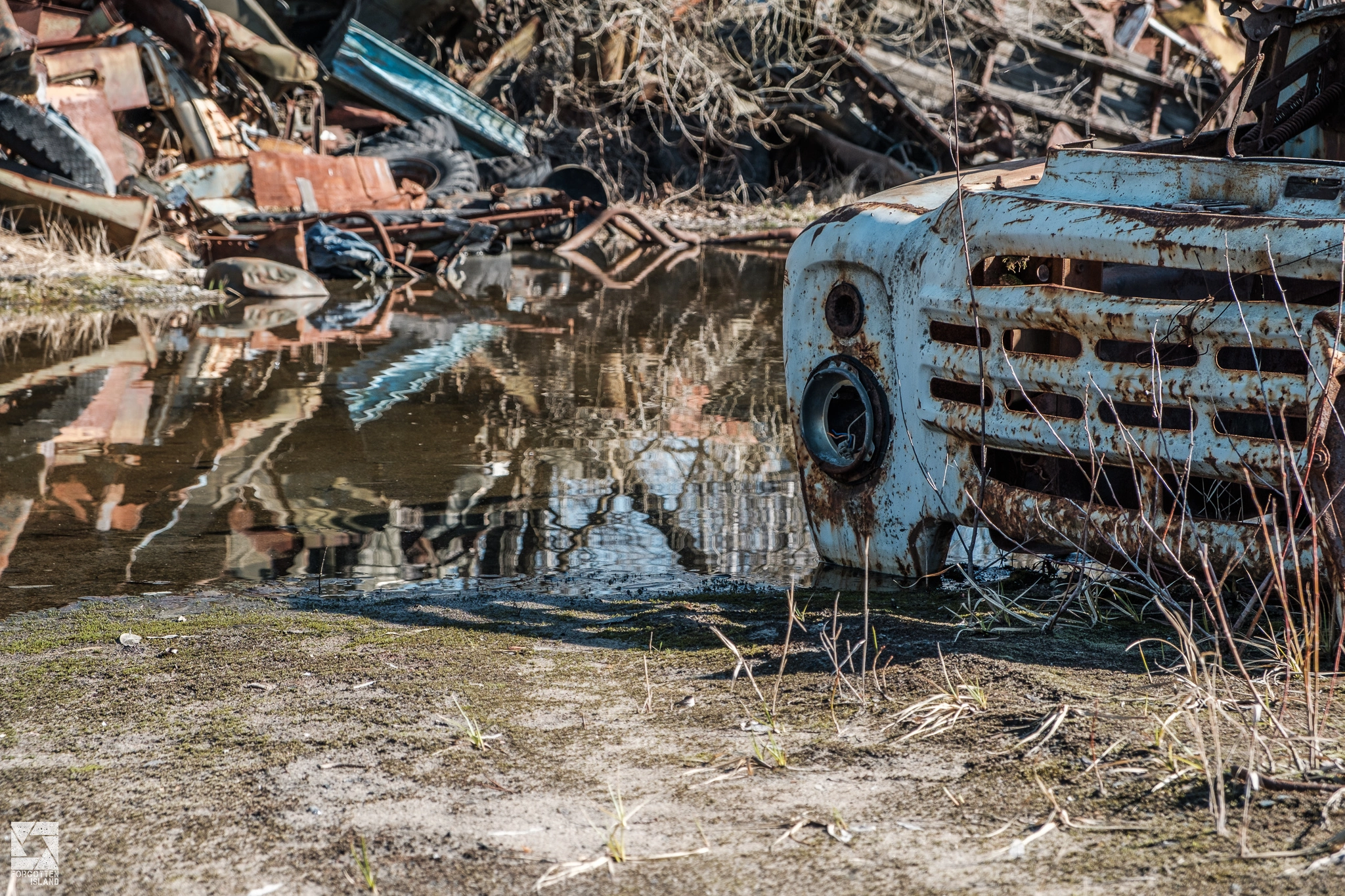 Chernobyl-Rossokha-Vehicle-Graveyard-09.webp