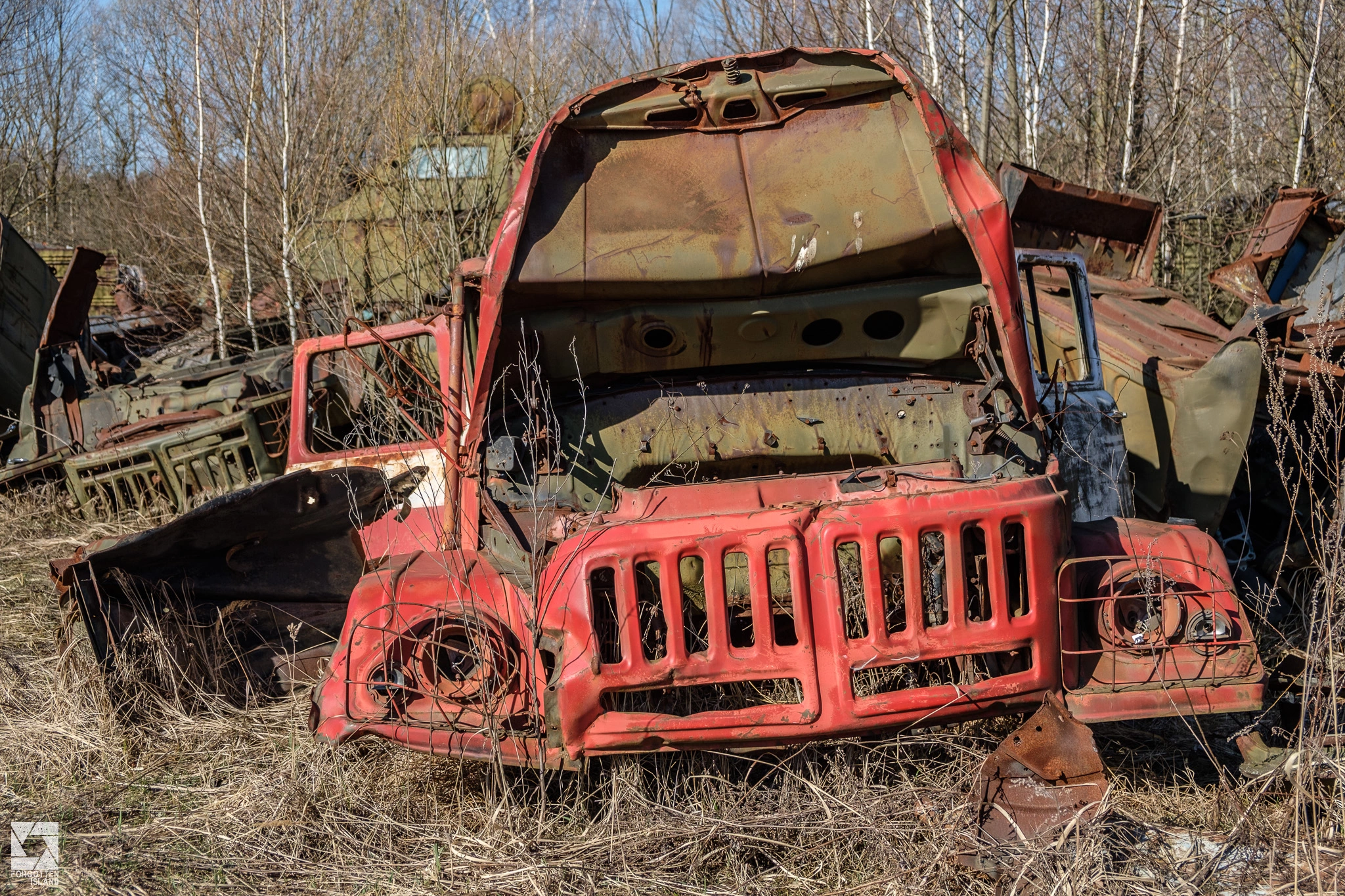Chernobyl-Rossokha-Vehicle-Graveyard-26.webp