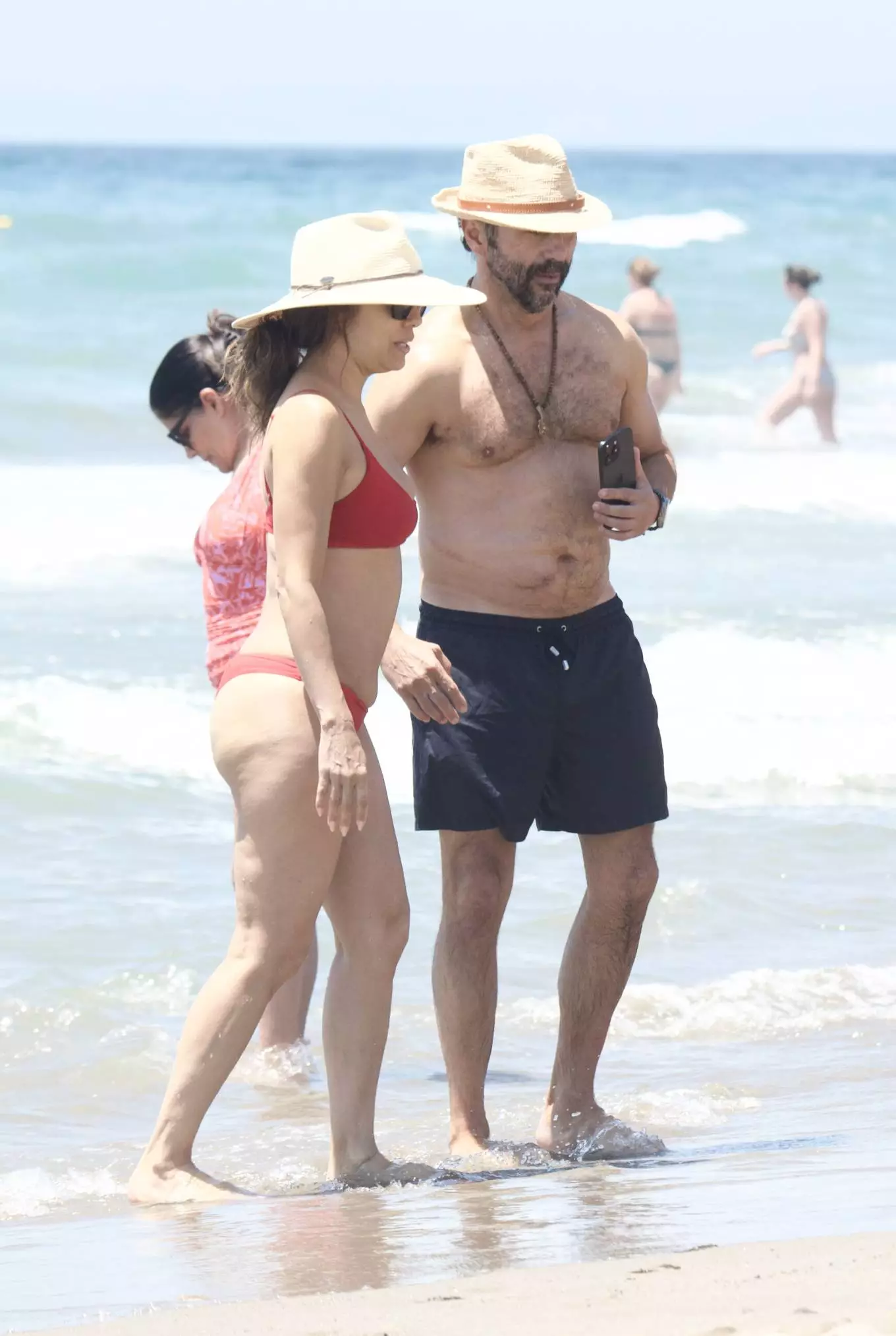 Eva-Longoria---In-a-bikini-at-the-beach-in-Marbella-02.webp