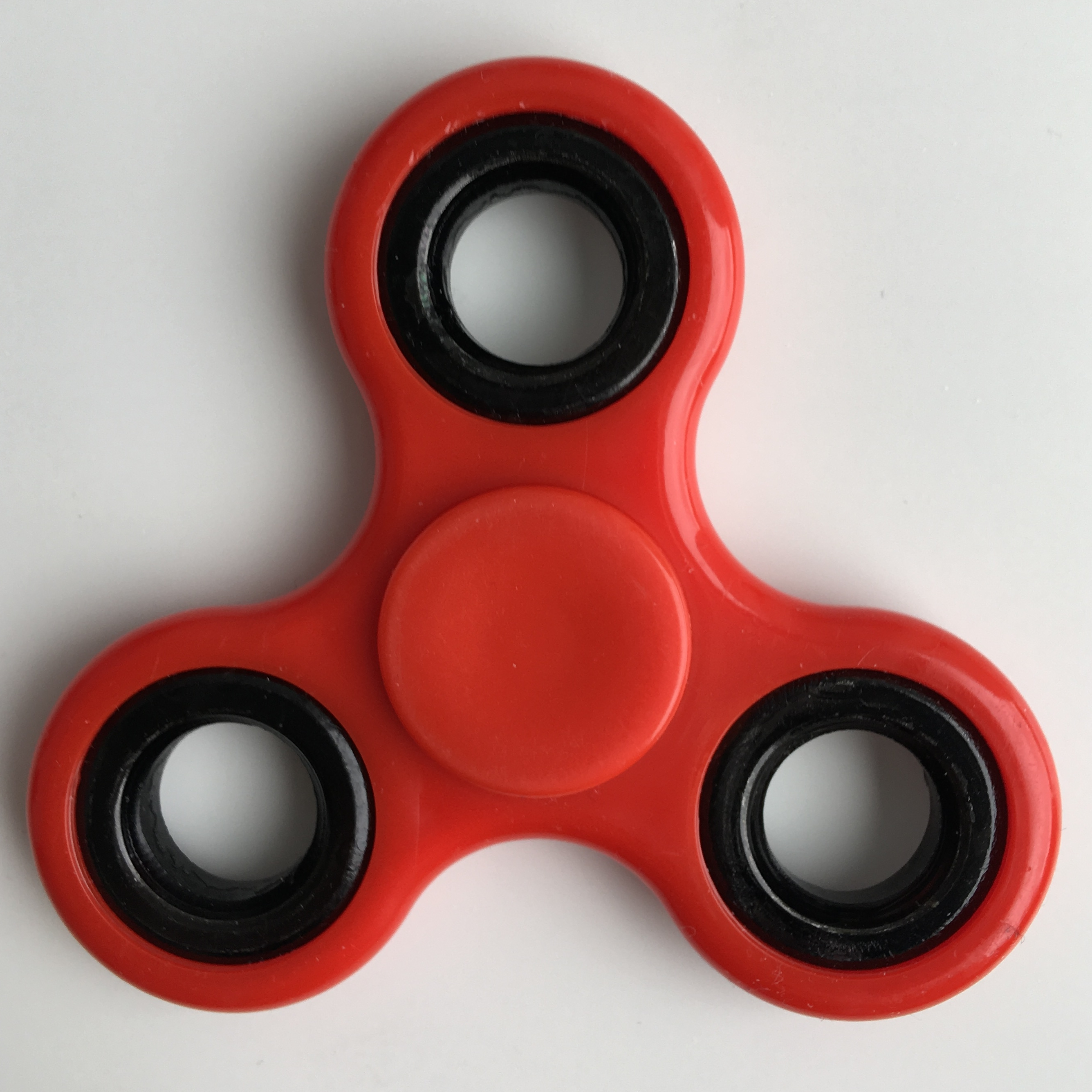 Fidget_spinner_red,_cropped.webp