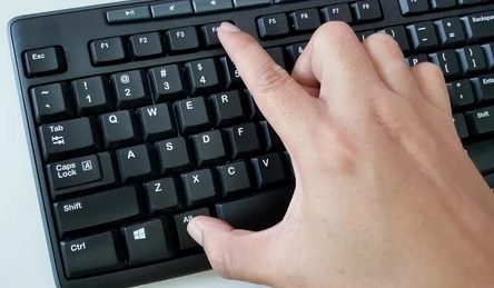 finger-pressing-altf4-command-on-260nw-502026403.jpg.webp