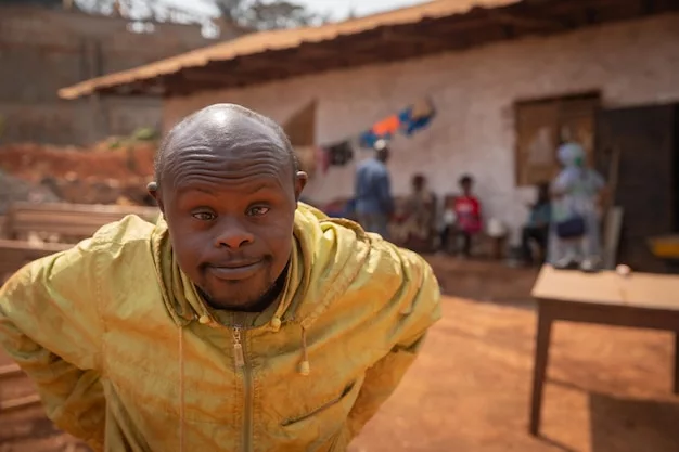 retrato-hombre-africano-sindrome-down-aldea-africana_404612-378.webp