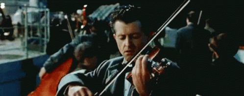 titanic-violin-band-music-k17np79r70ieu1ho.gif
