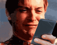 https://media.tenor.com/sq9YDOeaVV0AAAAM/toby-cry-phone-spider-man-cry-phone.gif