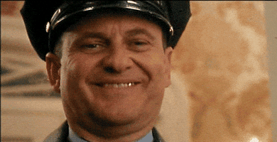 home alone wink GIF